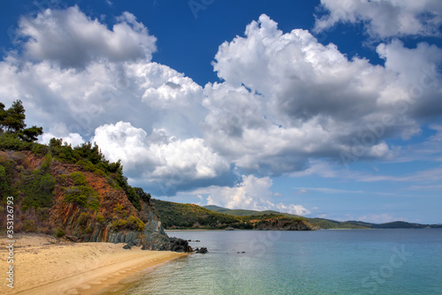 Beautiful seascape with beach, rocks and clear transparent water