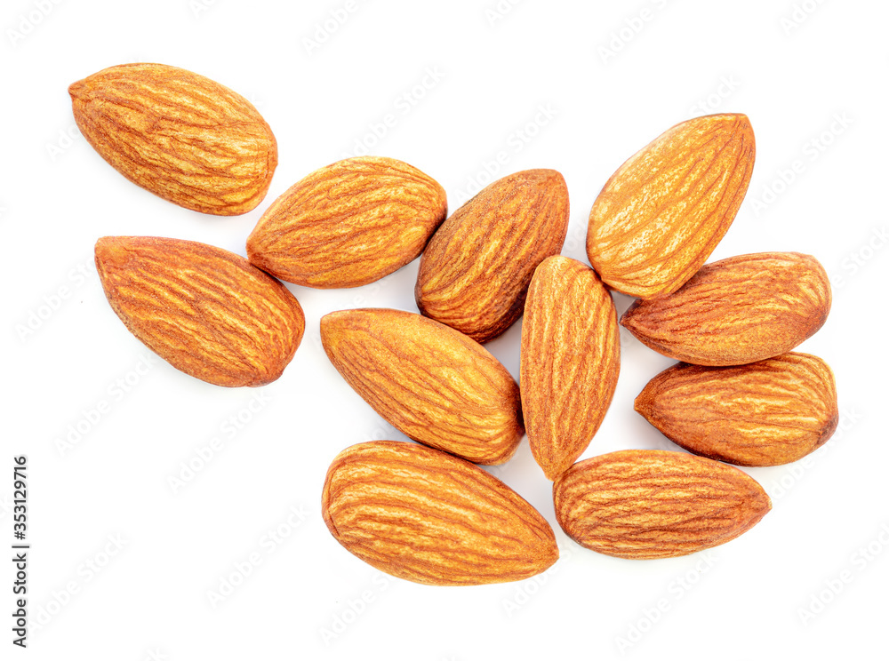 Almonds Isolated. Almond Nut heap on white background. Close up. Top view Almonds Isolated. Almond Nut heap on white background. Close up. Top view