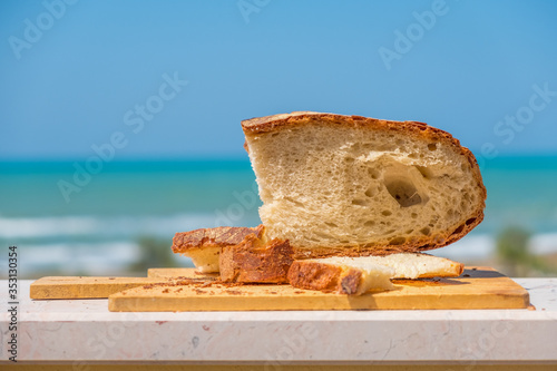 bakery shop background with Pane Pugliese, a traditional bread of South Italy food tradition