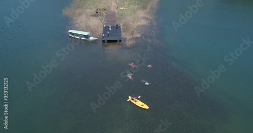 February 2019, Aerial of athletes or swimmers were swimming on Tuyen Lam lake photo