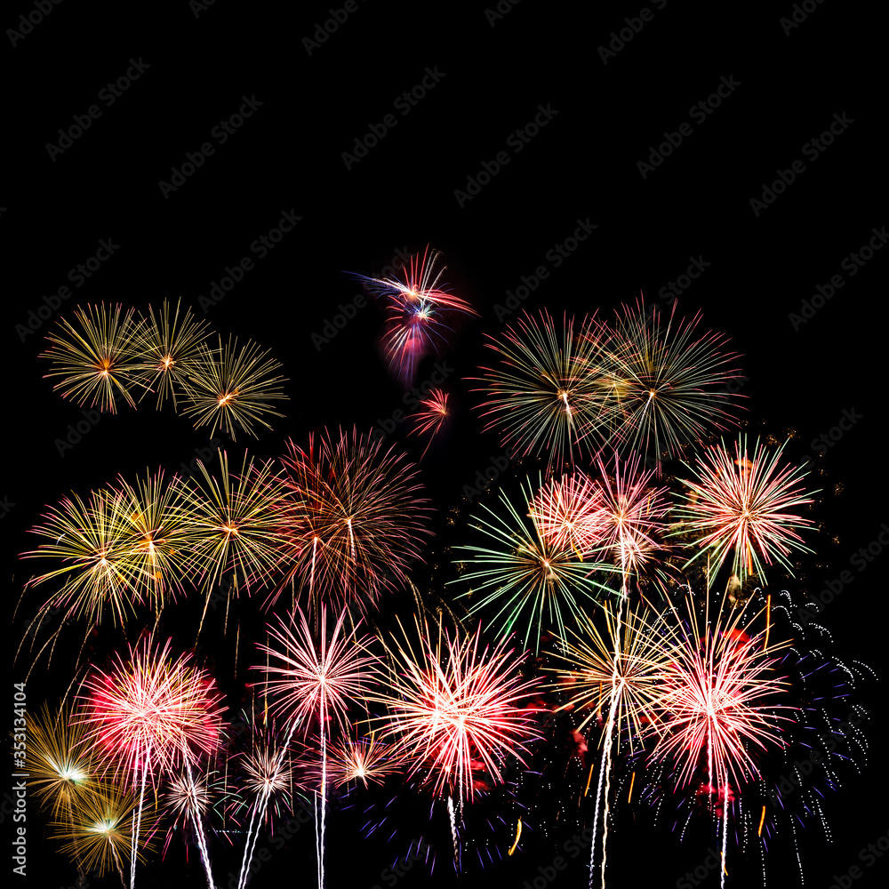 Beautiful display show of colorful fireworks on a night sky.