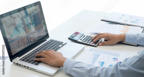 Business woman working on laptop with calculate of financial data