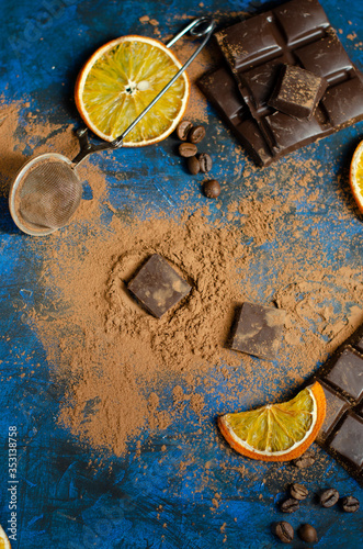 slice of dark chocolate in cocoa powder