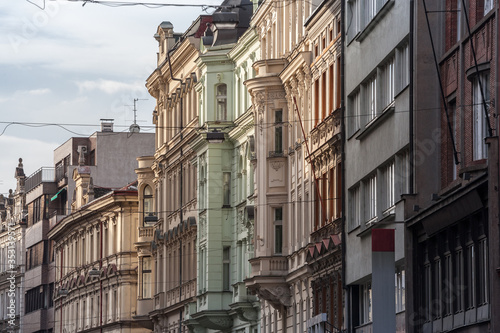 Facade of Old residential buildings from the 19th century in the city center of Prague, Czech Republic, used for accommodation on the real estate market.