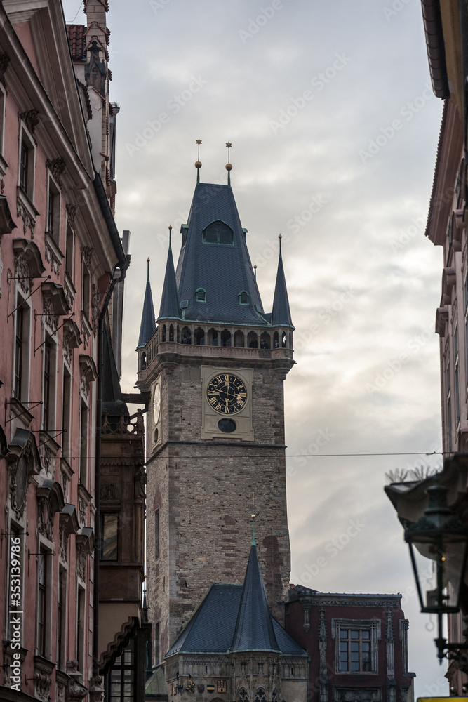 Clock tower of Old Town Hall, a major landmark of Prague, Czech Republic, also called staromestska radnice, surrounded by medieval buildings of the stare mesto district