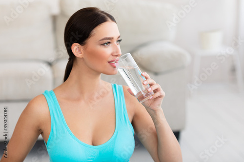 Fit Lady Drinking Glass Of Water Slimming At Home
