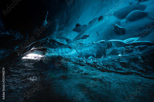Fantastic blue ice structures in the Icelandic ice cave. Closeup. Iceland.