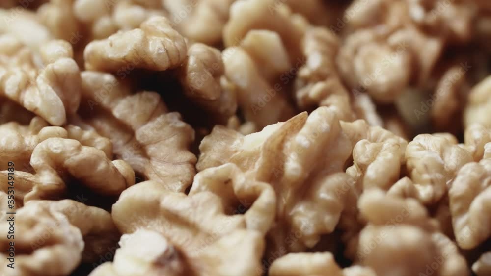 Dry walnut background, close up nut, rotation. Food background Dry walnut background, close up nut, rotation. Food background