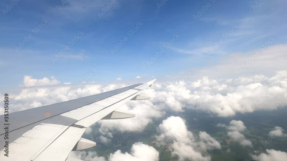 Airplane white wing move straight in sky Airplane white wing move straight in sky
