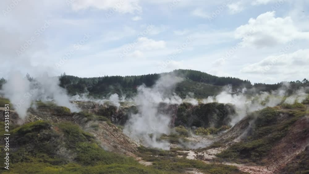 4k slight left to right panning motion of large mud Crater Fumarole at Craters of the Moon which is a thermal area that has a lot of geothermal steam activity north of Taupo, North Island, New Zealand 4k slight left to right panning motion of large mud Crater Fumarole at Craters of the Moon which is a thermal area that has a lot of geothermal steam activity north of Taupo, North Island, New Zealand