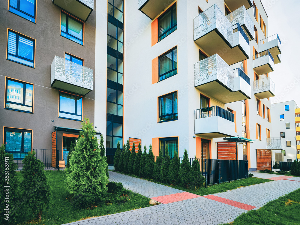Apartment residential modern house building exterior and fence concept_4x3 Apartment residential modern house building exterior and fence concept_4x3