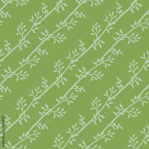 Seamless pattern with light green branches on green background for fabric, textile, clothes, tablecloth and other things. Vector image.