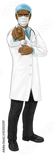 A doctor medical healthcare professional. Pointing at the viewer in a needs or wants you gesture with serious but caring look. Wearing PPE including face mask.