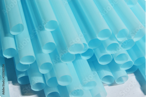 
Blue plastic tube on a white background