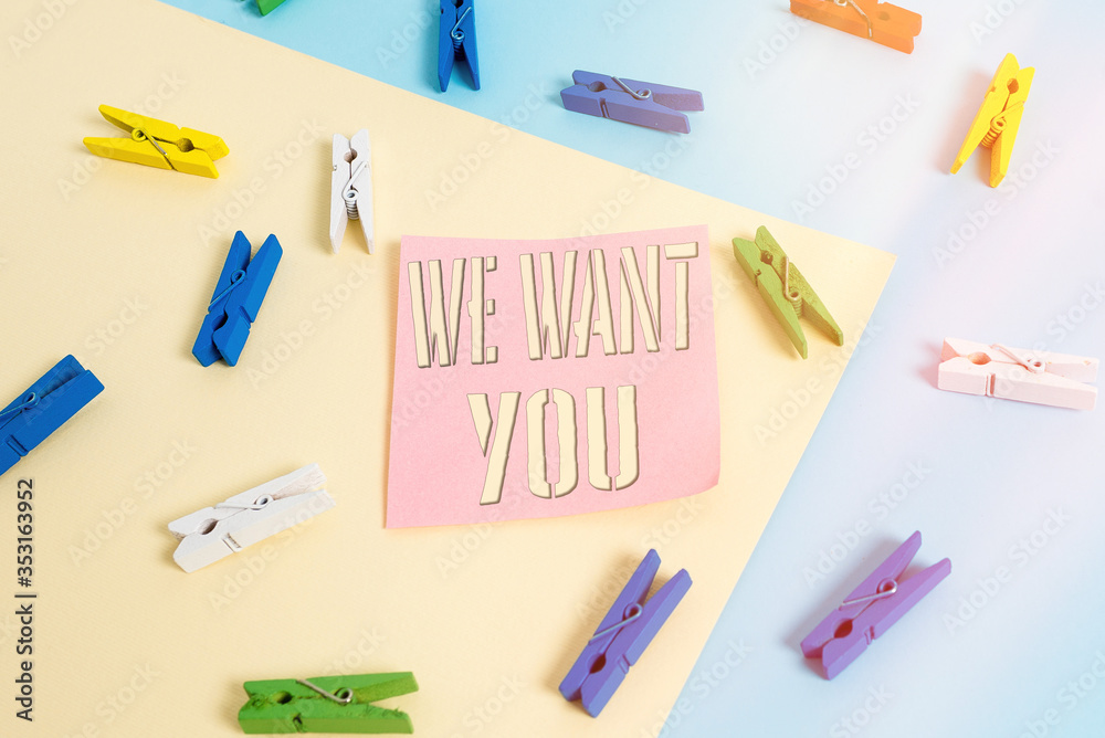 Writing note showing We Want You. Business concept for having a desire or would like an individual to do something Colored clothespin paper reminder with yellow blue background Writing note showing We Want You. Business concept for having a desire or would like an individual to do something Colored clothespin paper reminder with yellow blue background