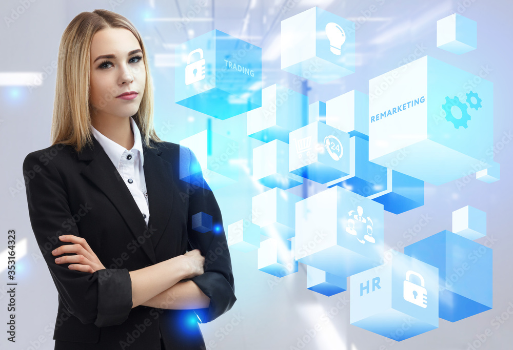 Business, Technology, Internet and network concept. Young businessman working on a virtual screen of the future and sees the inscription: Remarketing Business, Technology, Internet and network concept. Young businessman working on a virtual screen of the future and sees the inscription: Remarketing