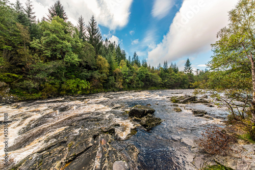 The flow of the River Moriston (river of the waterfalls)  photo