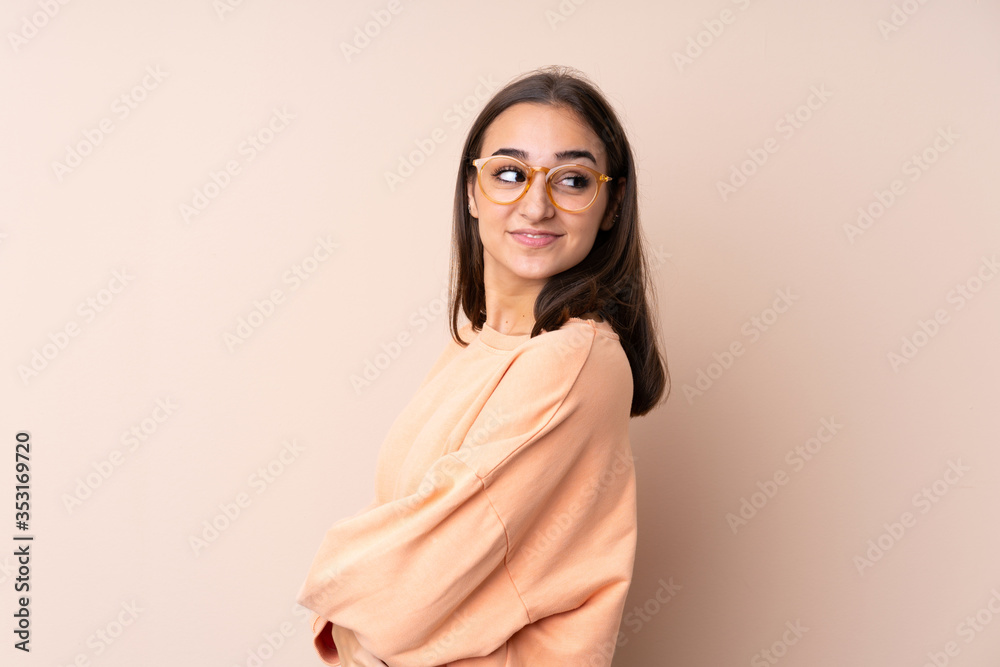 Young girl over isolated background laughing Young girl over isolated background laughing