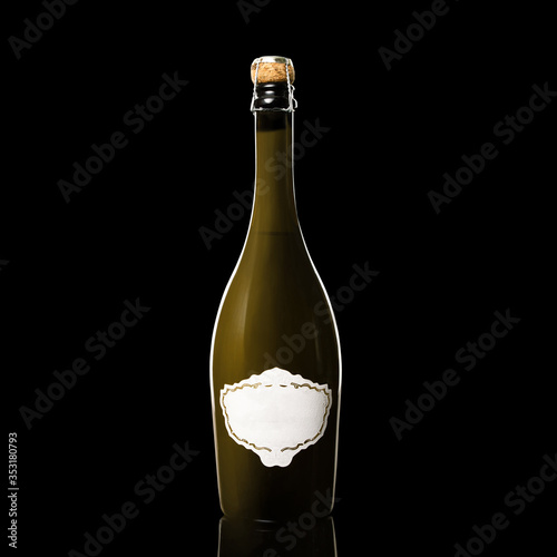 Champagne bottle photographed in the professional studio with strobe lights.