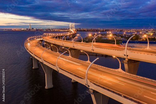 Saint Petersburg. Russia. Bridge over the Gulf of Finland. Bridges of St. Petersburg. Panorama of night Petersburg. Traveling in Russia by Car. Roads of Russia. Dawn over the city. City night lights