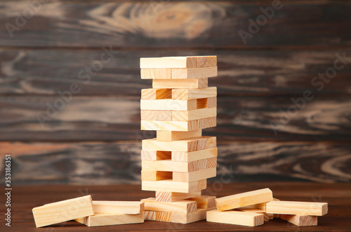 Business risk concept with wood game. Top view photo