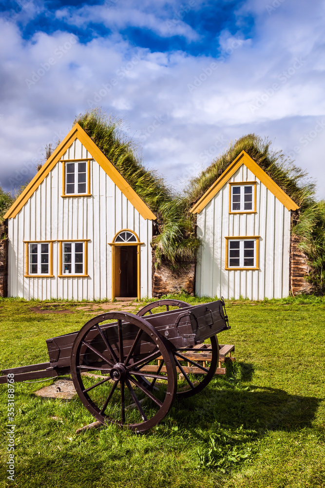 Fototapeta premium The houses and rural cart