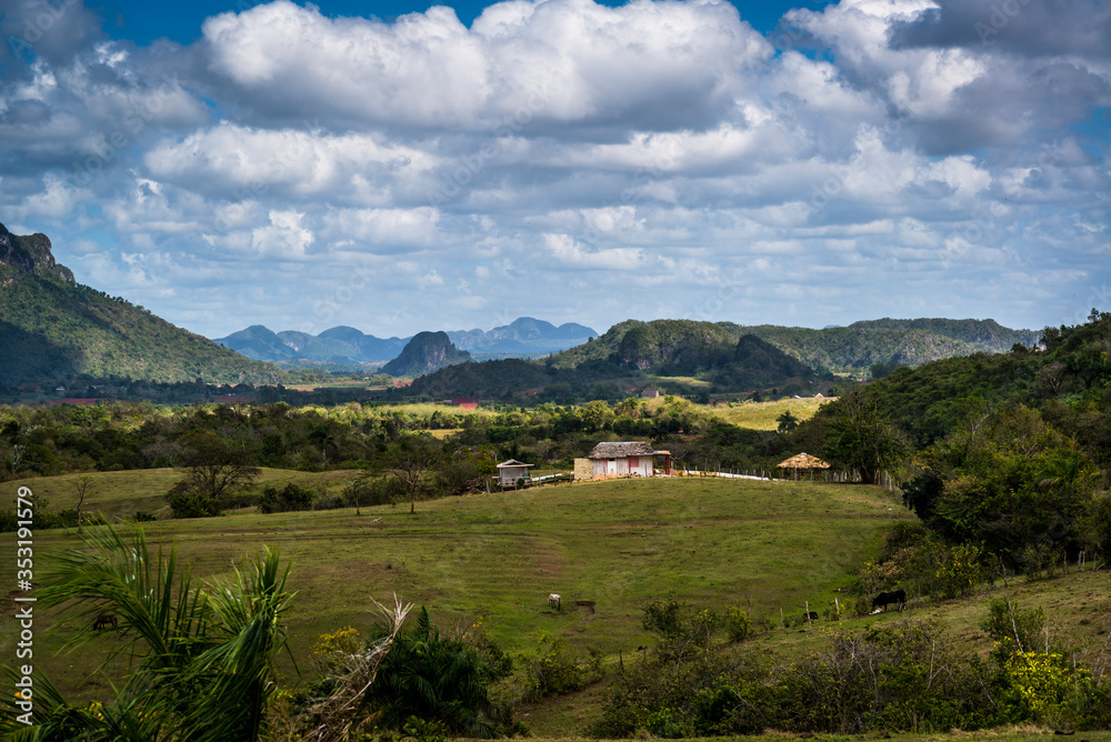 Farm houses and agricultural land in the Vinales Valley, know for its unique mountain karst formations called magote, Cuba