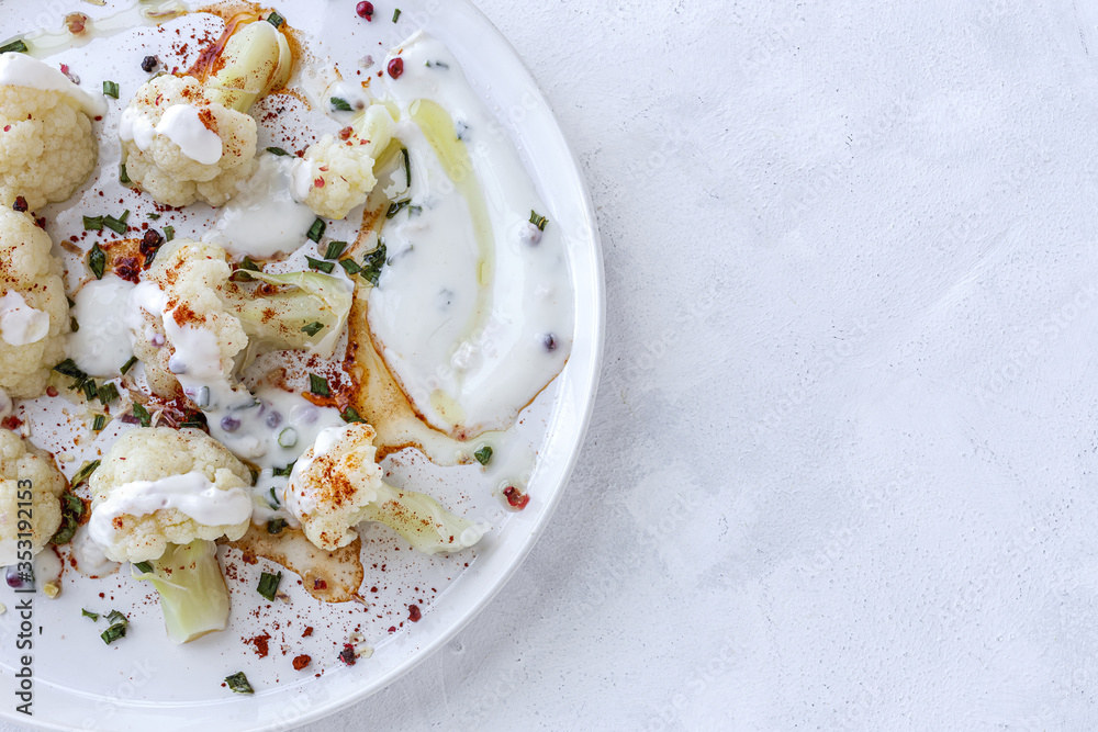 Cauliflower salad with spices and olive oil from above