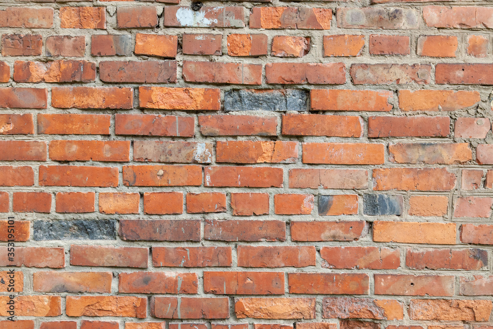 old crumbling abandoned brick wall. close up view