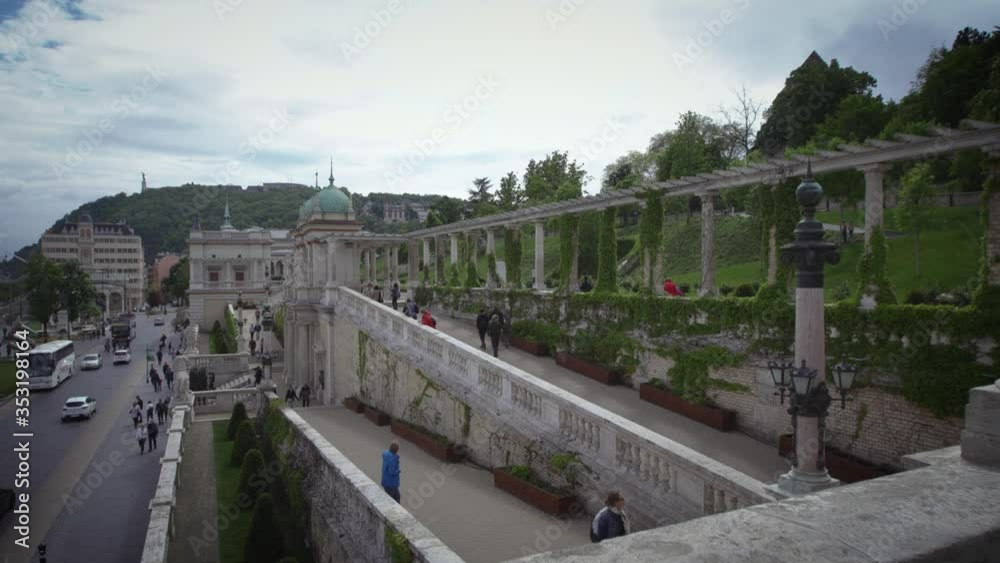 Budapest Hungary Pushing Through the Columns in Front of the Castle Slow Motion Budapest Hungary Pushing Through the Columns in Front of the Castle Slow Motion