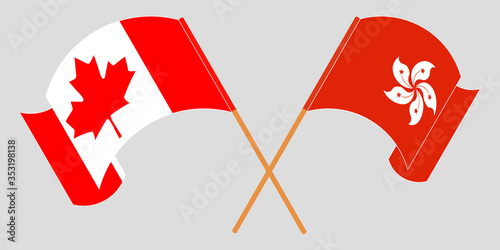 Crossed and waving flags of Hong Kong and Canada