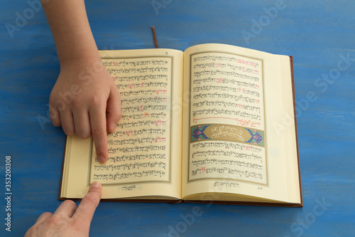 Teach to kid Al Quran at home.