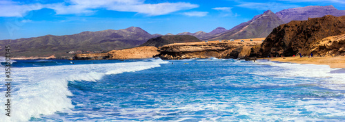 Impressive unspoiled beaches of Fuerteventura island. La Pared beach -popular spot for surfing. Canary islands
