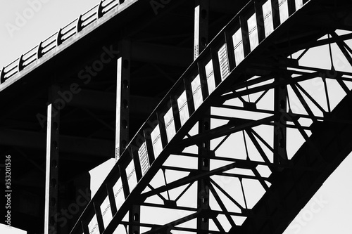 Closeup of metal suspension bridge.