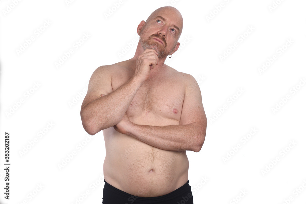 shirtless man who is thinking on white background shirtless man who is thinking on white background