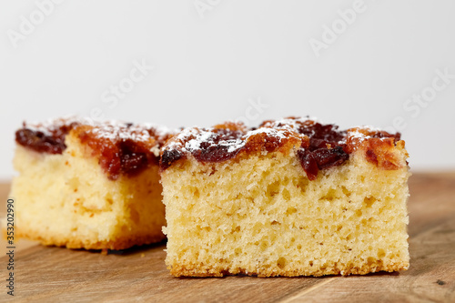 Side view of two portions of cherry pie