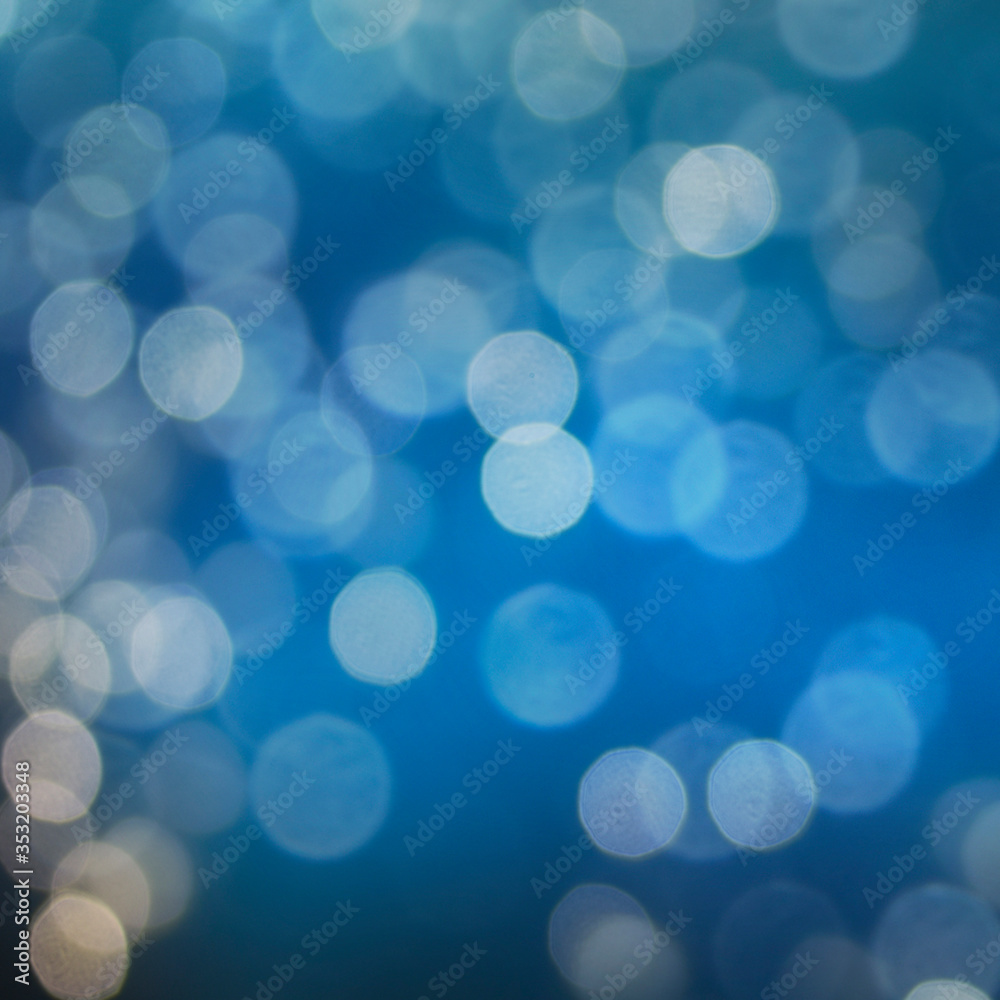 Christmas light background. Holiday glowing backdrop. Defocused Background With Blinking Stars. Blurred Bokeh. Christmas light background. Holiday glowing backdrop. Defocused Background With Blinking Stars. Blurred Bokeh.