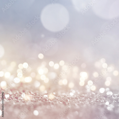Christmas light background. Holiday glowing backdrop. Defocused Background With Blinking Stars. Blurred Bokeh.