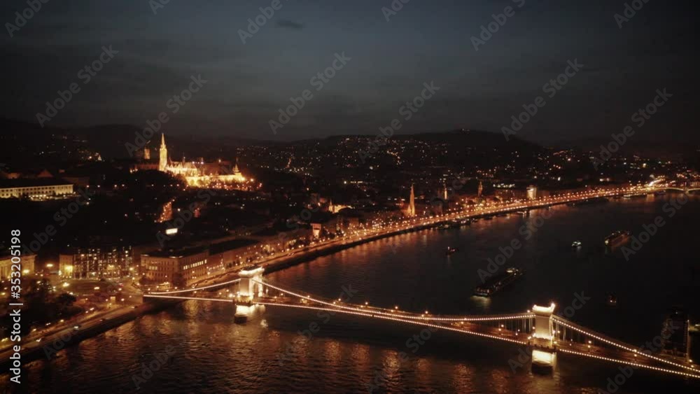 Budapest Hungary Aerial Rising Pulling Back Over the Danube River at Night