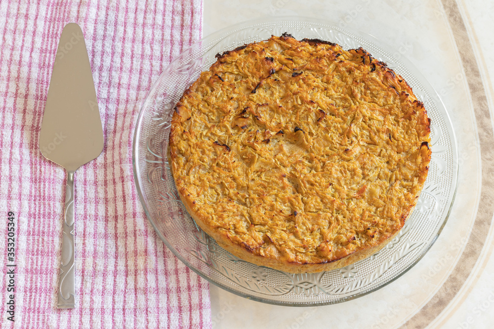 Homemade Roasted vegetable quiche pie Delicious vegetarian food. freshly baked
Onions carrots squash courgettes KUGEL