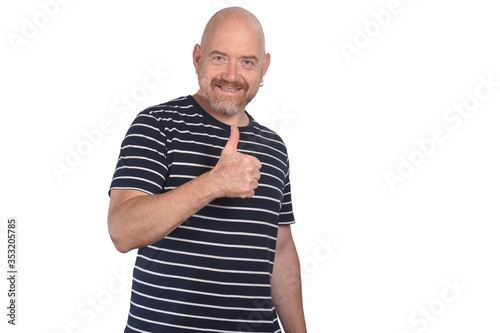 portrait of a man with thumbs up on white background © curto