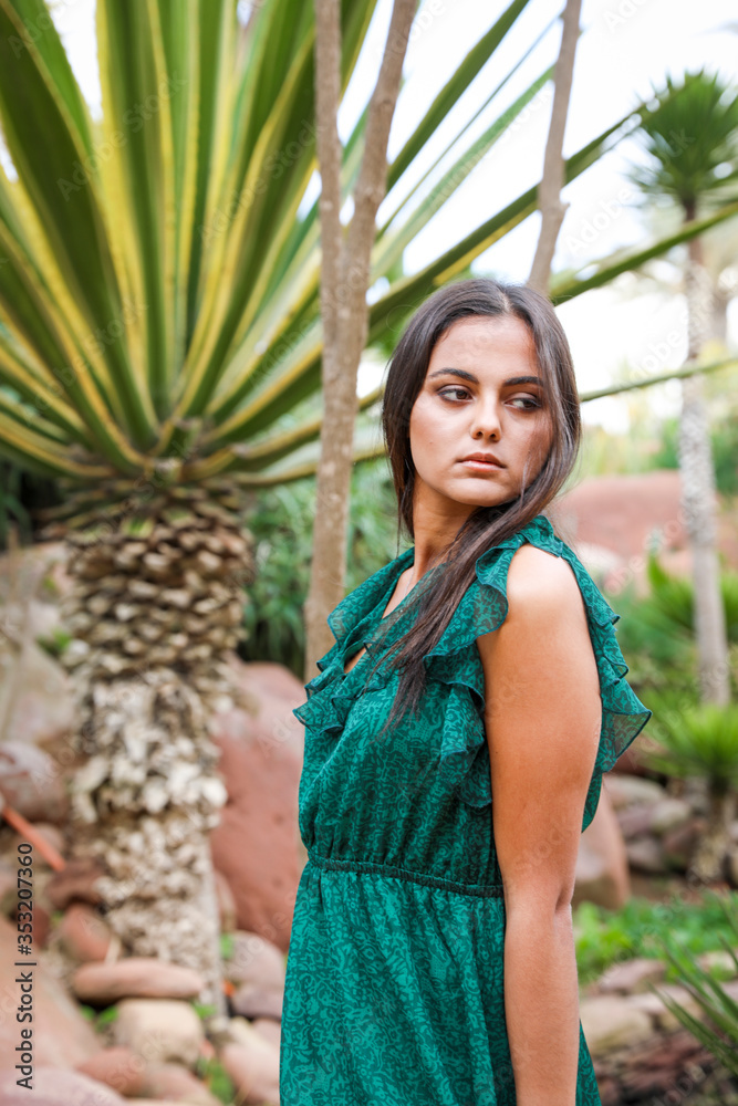 Chic girl in a long evening dress.
