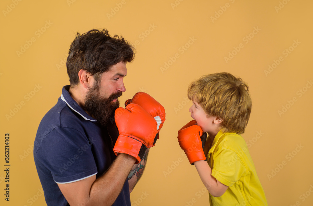 Box. Boxer. Ready for sparring. Little kid boxing with coach. Sport lifestyle. Training together. Family workout. Box. Boxer. Ready for sparring. Little kid boxing with coach. Sport lifestyle. Training together. Family workout.