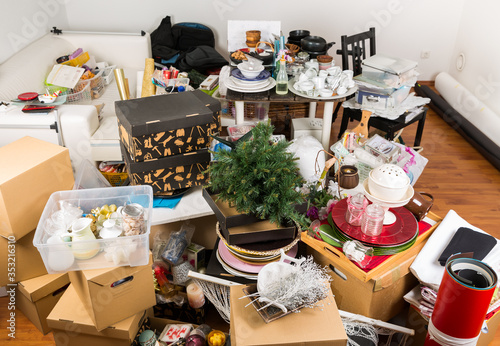 Messy room full of clutter and junk - Compulsive hoarding disorder photo