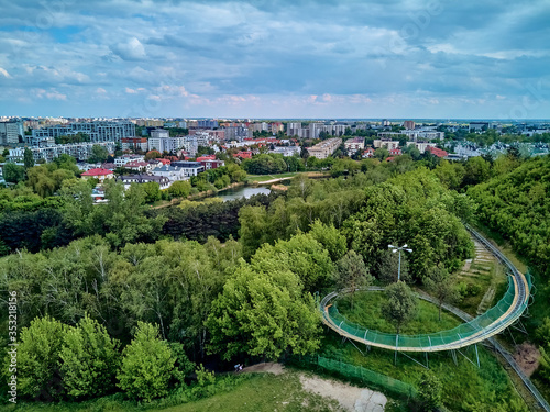 A beautiful panoramic view of the sunset in a fabulous evening on Szczesliwice Park - a former village, currently a housing estate in the Ochota district in Warsaw, Poland