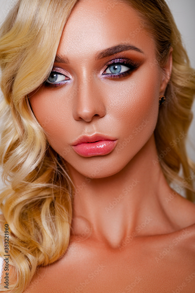 Gorgeous bride with luxurious twinkling make-up in brown and pink-purple hues. Makeup Details. Thick and long eyelashes. Nude Lipstick on Plump Lips. Closeup portrait girl. perfect makeup for bride   