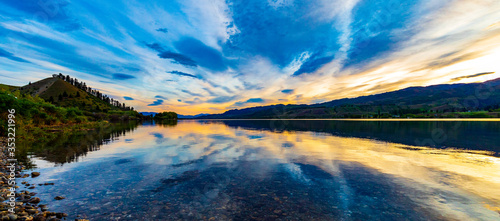 The Sun Rises On Lake Dunstan In New Zealand photo