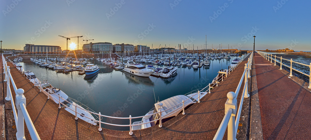 Panoramic image of Elizabeth Marina, St Helier early morning from the West  marina wall with the