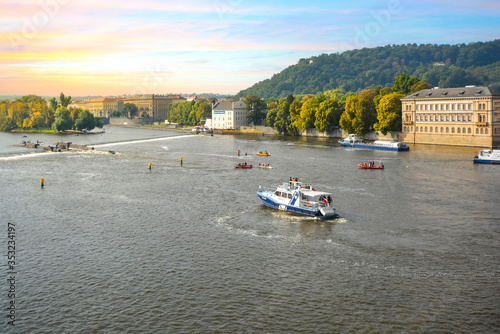 Photography A busy day as boats and rafts cruise the Vltava River and appear on a rescue mission near the Charles Bridge in Prague, Czech Republic