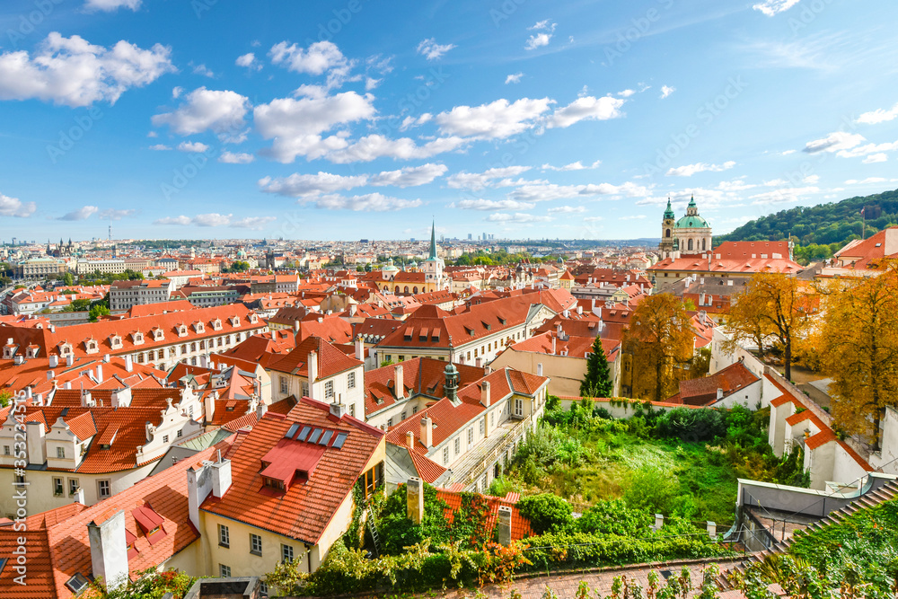 View of Prague including Mala Strana or Lesser Town, parts of Old town, the Vltava river and the red rooftops from the Prague Castle Complex